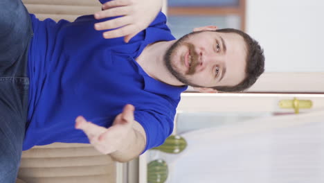 Vertical-video-of-Happy-man-dancing-to-the-camera.